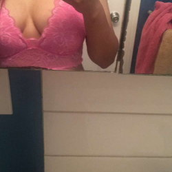 Cute Latina in pink bralette