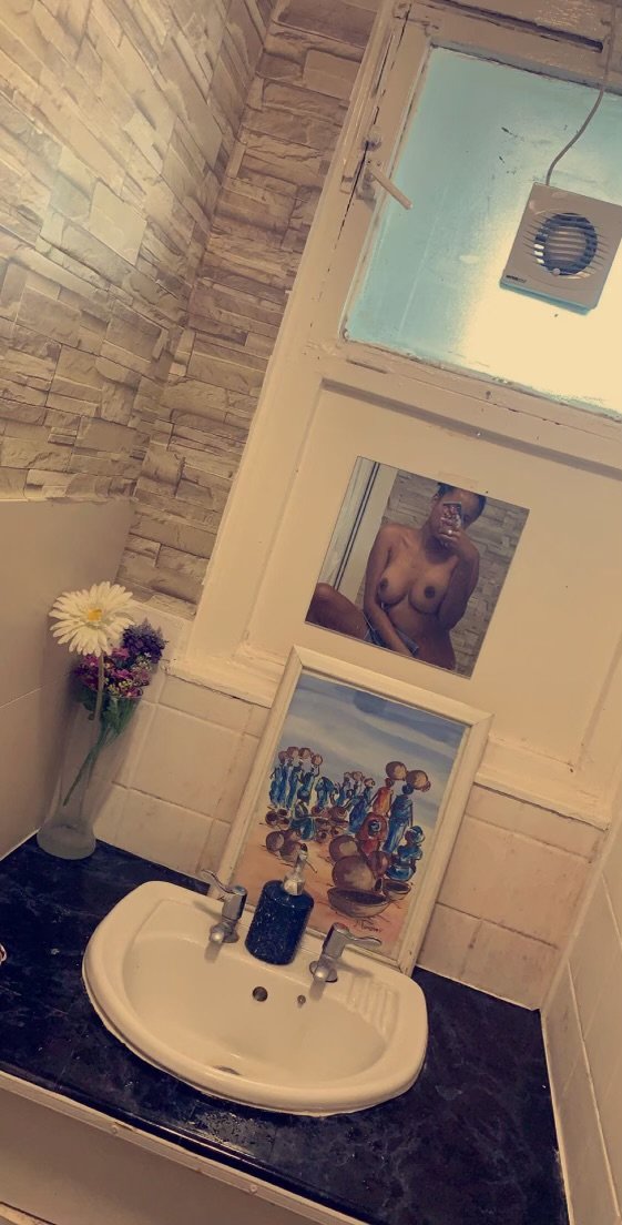 The bathroom mirror #TQRJ43Ia