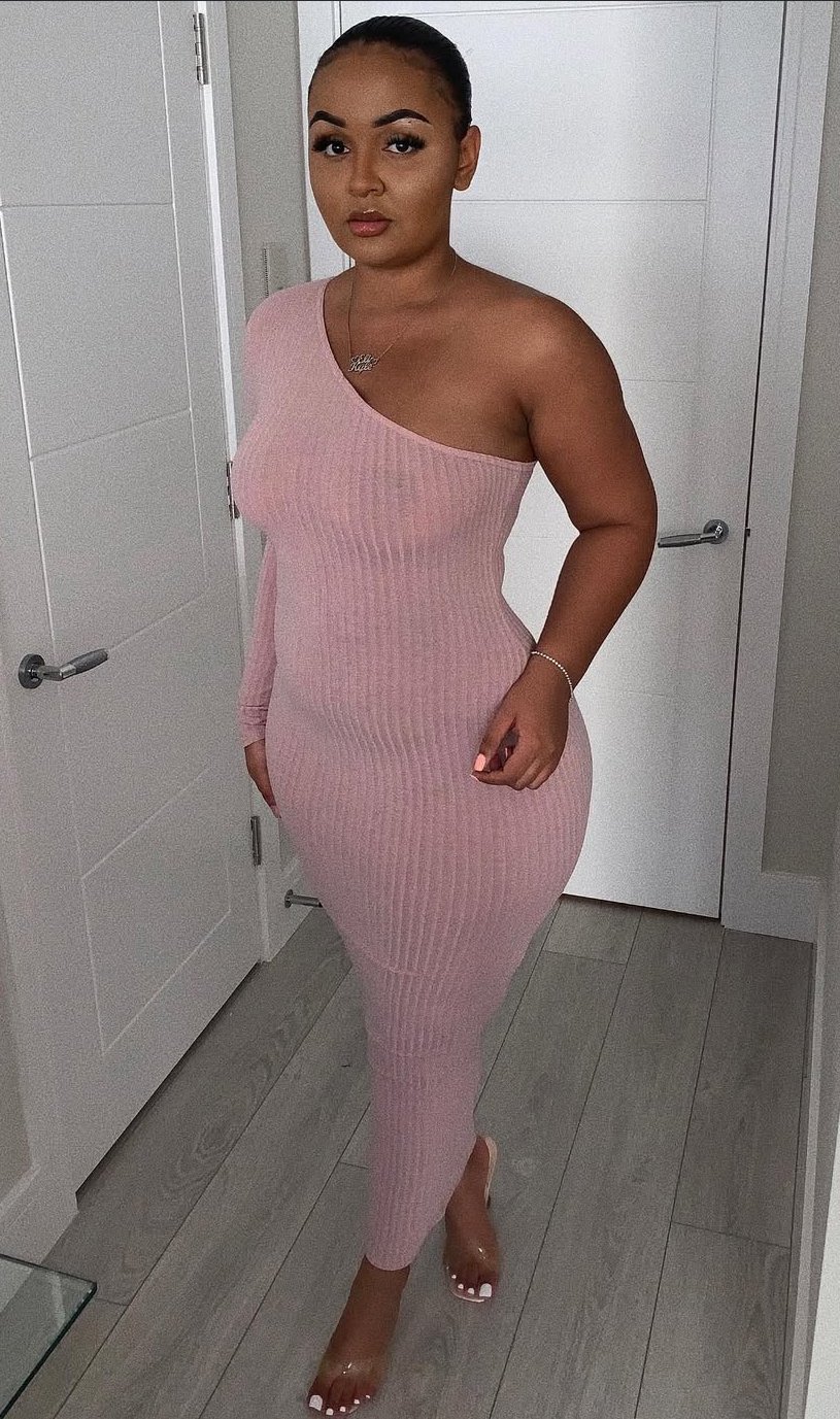 Do you think this dumb nigga knows everyone can see her dark black nipples through that dress? #abt1LpAJ