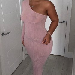 Do you think this dumb nigga knows everyone can see her dark black nipples through that dress?