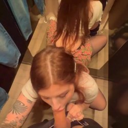 Insanely sexy amateur redhead sucks cock in dressing room