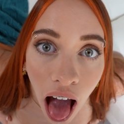 Redhead girl with bracers