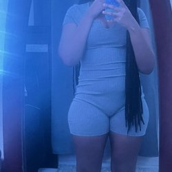 Sexy ebony posing in front of the mirror