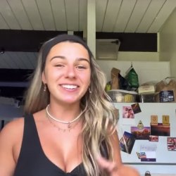 She took some guy off behind the house and let him fuck her tits wearing this outfit