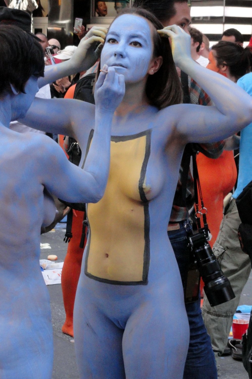 Nudist girls doing body paint in public #cIqjHaWU