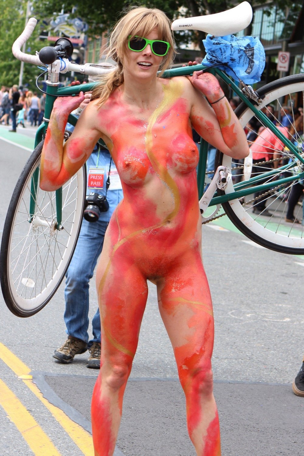 Nudist girls doing body paint in public #ftQRy8oO