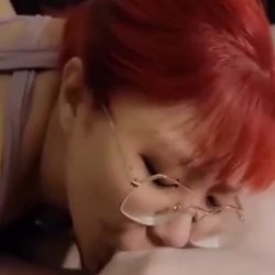 Redhead asian giving blowjob