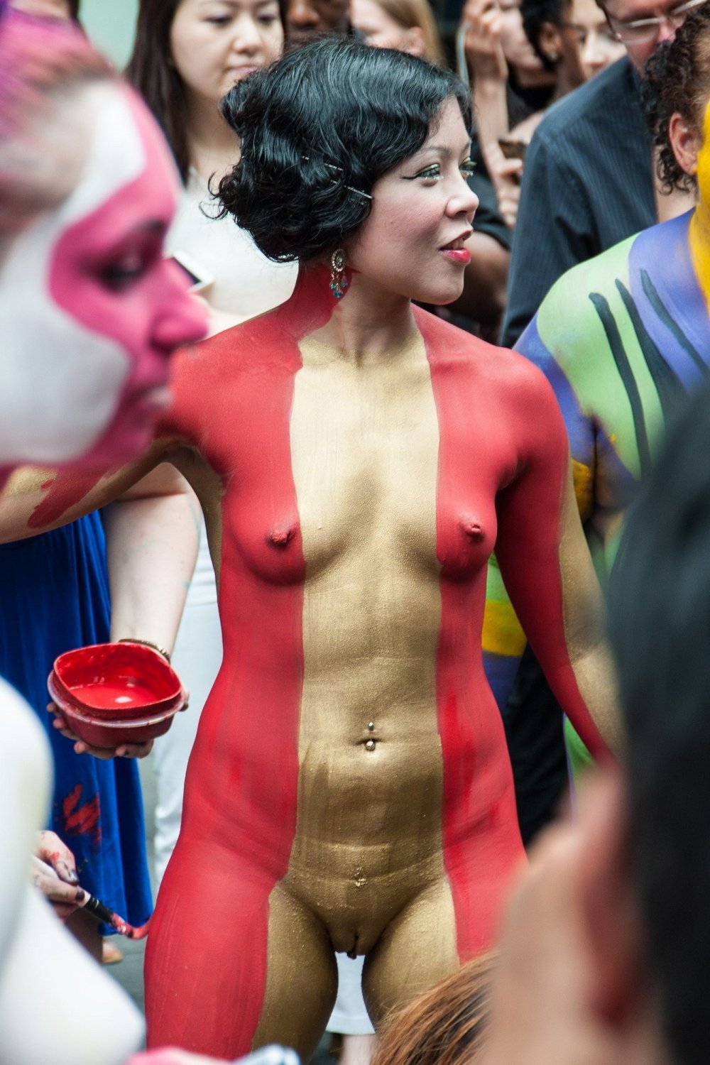 Nudist girls doing body paint in public #TulpO5fl