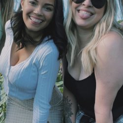 Blonde slut purposely squeezing her tits together trying to compete with her friend