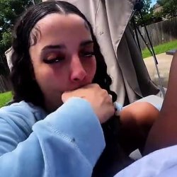 Outside making him buss a big nut on her face