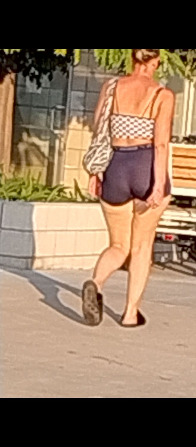 slutty girl walks around and shows off her beautiful ass. u know she wanted it to be seen and even p #G6DUqGrv
